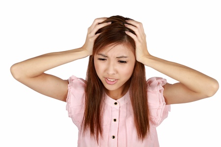 9689649 - young asian woman having a headache. isolated on a white background.